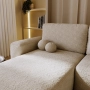 Bouclé U-Sofa mit Schlaffunktion & runden Formen Ornello U