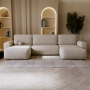 Bouclé U-Sofa mit Schlaffunktion & runden Formen Ornello U