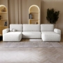 Bouclé U-Sofa mit Schlaffunktion & runden Formen Ornello U