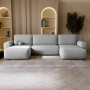 Bouclé U-Sofa mit Schlaffunktion & runden Formen Ornello U